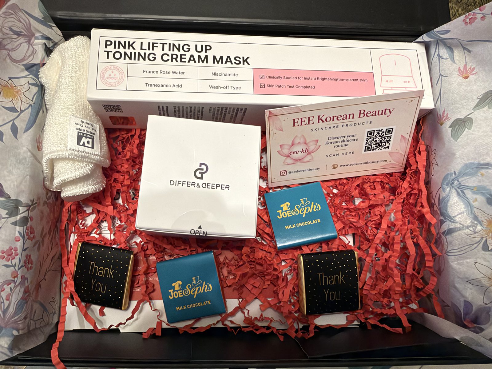 Red Renewal Bundle top view with chocolates and thank you card